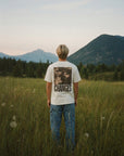 CTC approved original | pixels:83227120496a95298cc5538d2ffd4b232cf2a57cf3fded1dd069748e0428a900 | Changes Tee | source:blondeguy_changes-tee_mountain-back.jpeg | side:back
