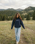 CTC approved original | pixels:ed3b9a99f68d3b35be18bee29f1497dbde2b1f4bcfe4c5cea139e7ccd8d04b07 | Matthew 17:20 Hoodie | source:brunette_matthew-1720-hoodie_mountain-walk.jpeg | side:front