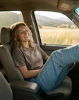 Woman wearing Matthew 5:3 Beatitudes tee in truck - CarryTheCross