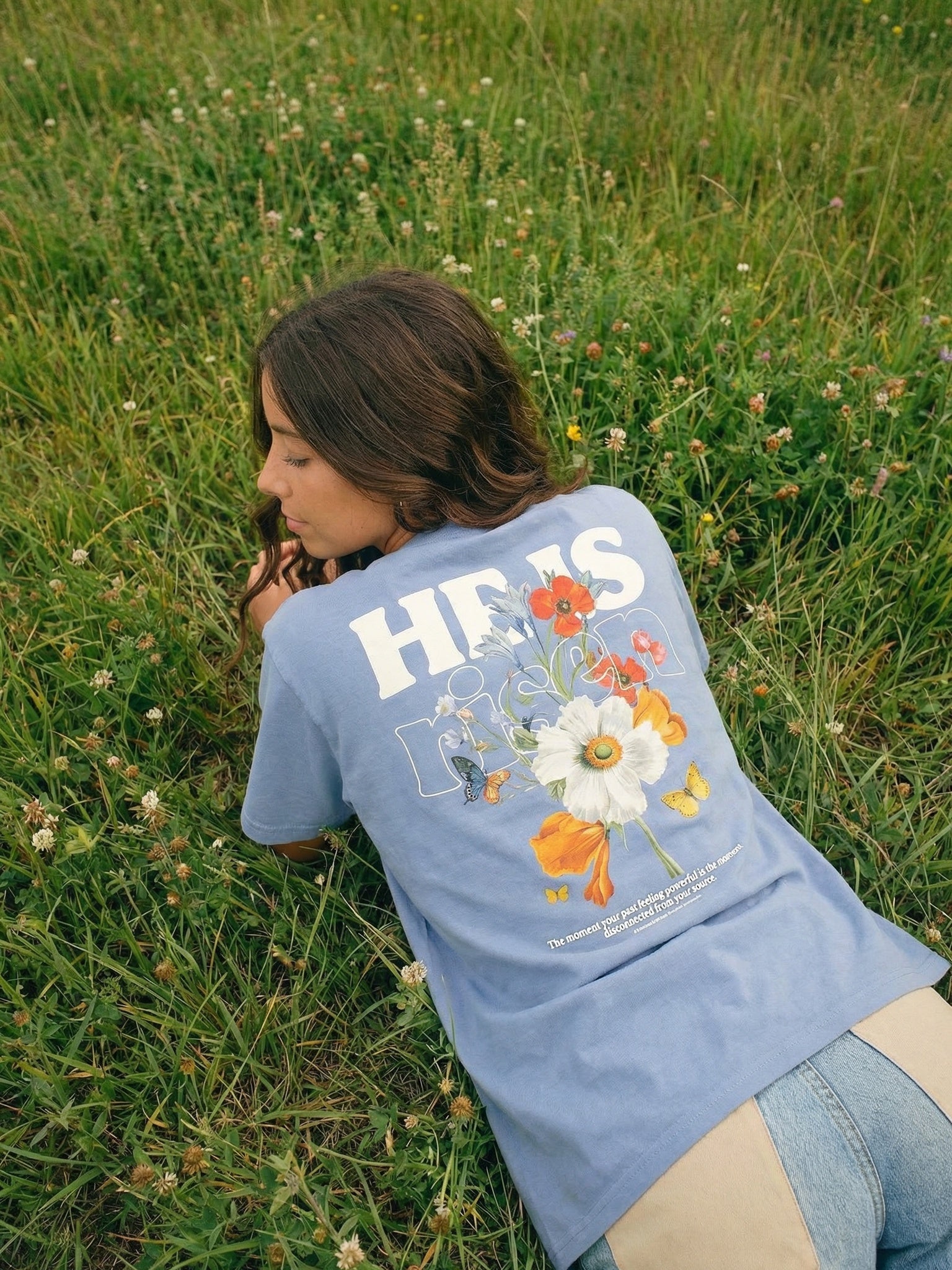 CTC approved original | pixels:aa0f2a8b6f3a6d738ec7fda1f950c8aa7dce93a3fd5cf914c27d3afe0898c937 | He Is Risen Tee | source:brunette_he-is-risen-tee_field-back.jpeg | side:back