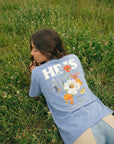 CTC approved original | pixels:aa0f2a8b6f3a6d738ec7fda1f950c8aa7dce93a3fd5cf914c27d3afe0898c937 | He Is Risen Tee | source:brunette_he-is-risen-tee_field-back.jpeg | side:back