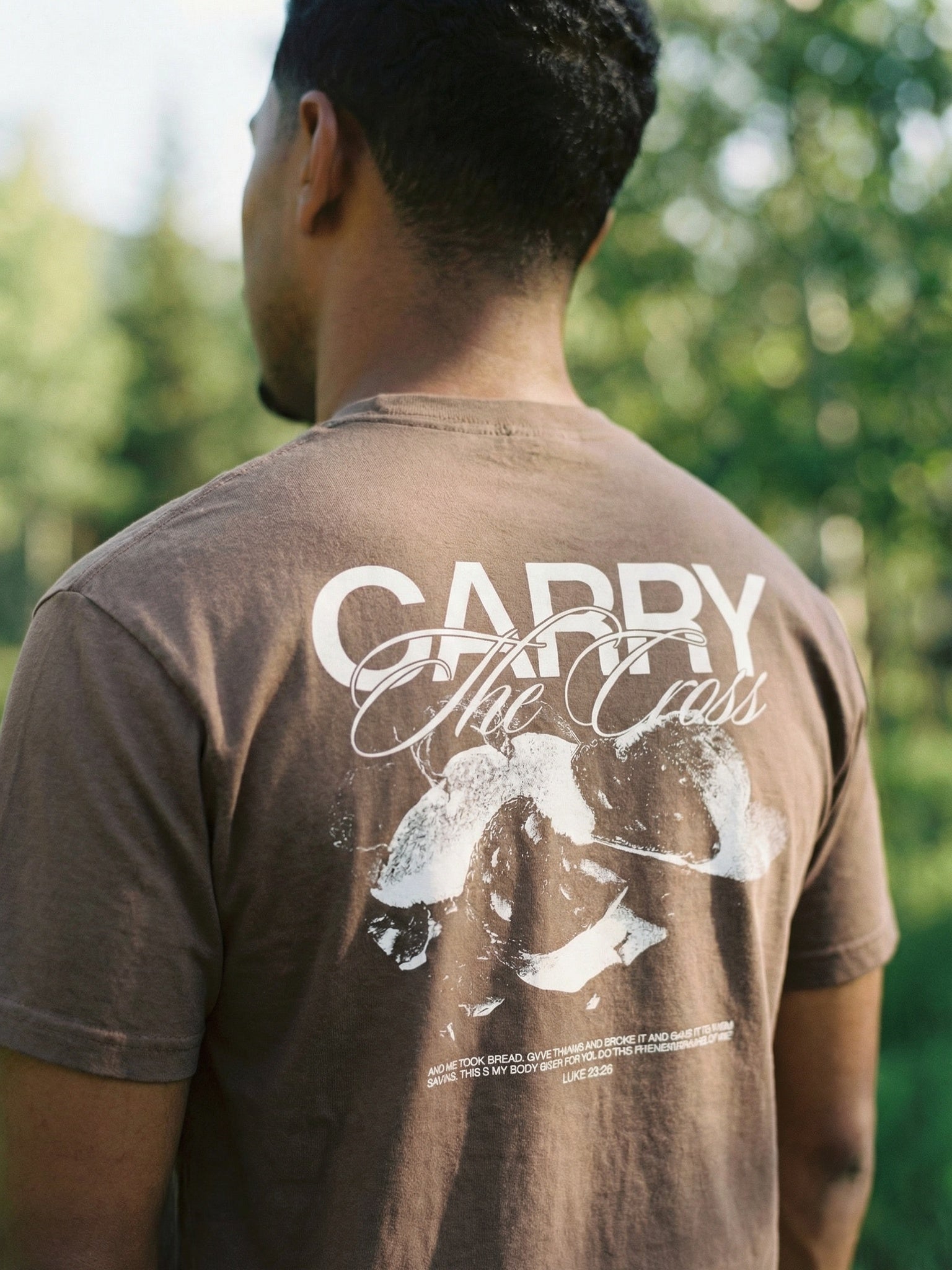 Man wearing Break Bread tee outdoors close-up - CarryTheCross
